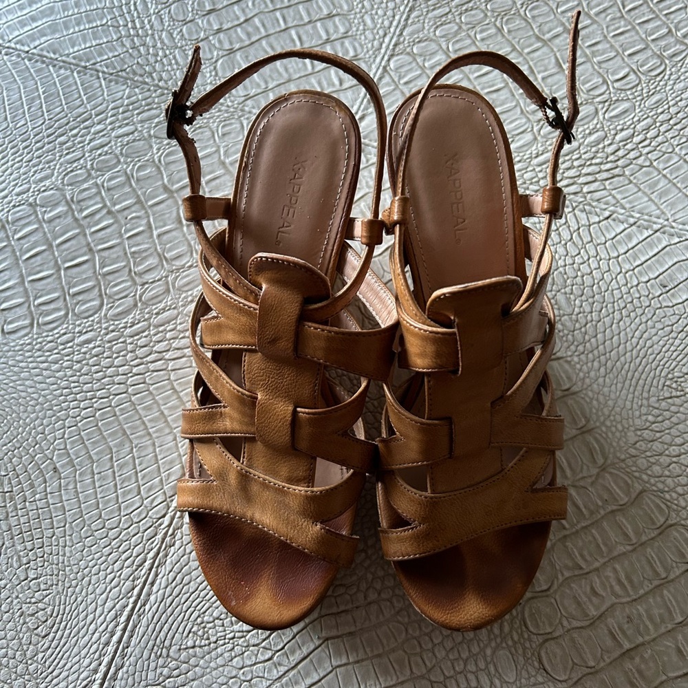 Tan wedge sandals in good used condition